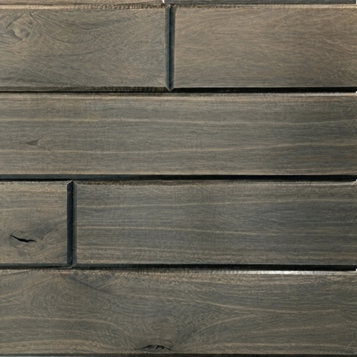 Red Grandis Ebony sample boards showing natural variation