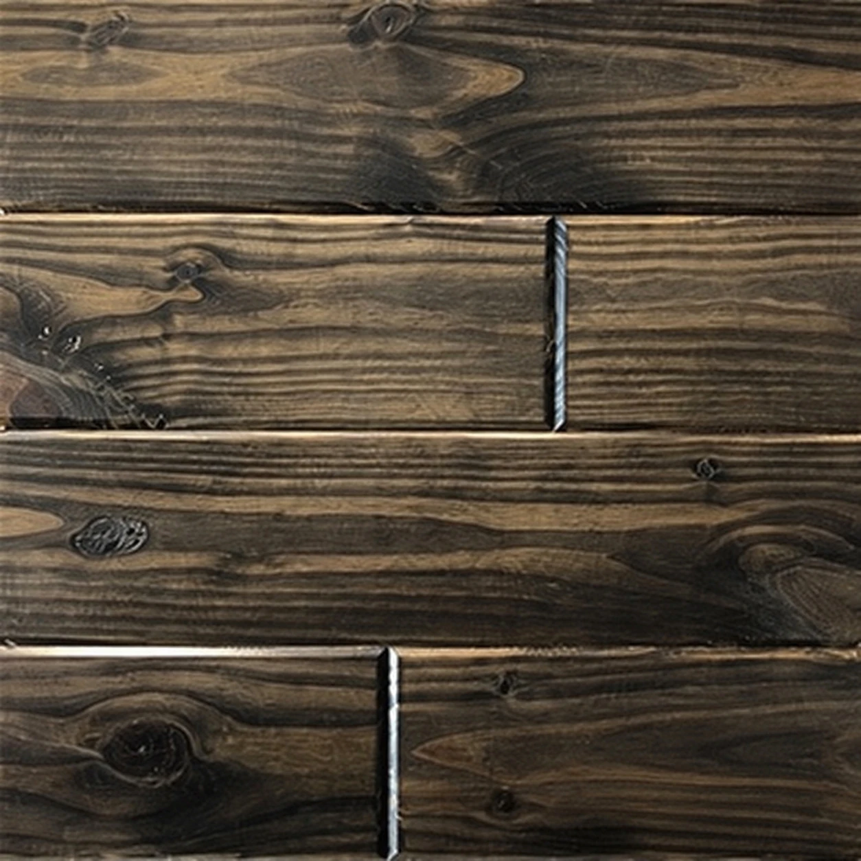 Southern Pine Ebony finish boards showing natural variation
