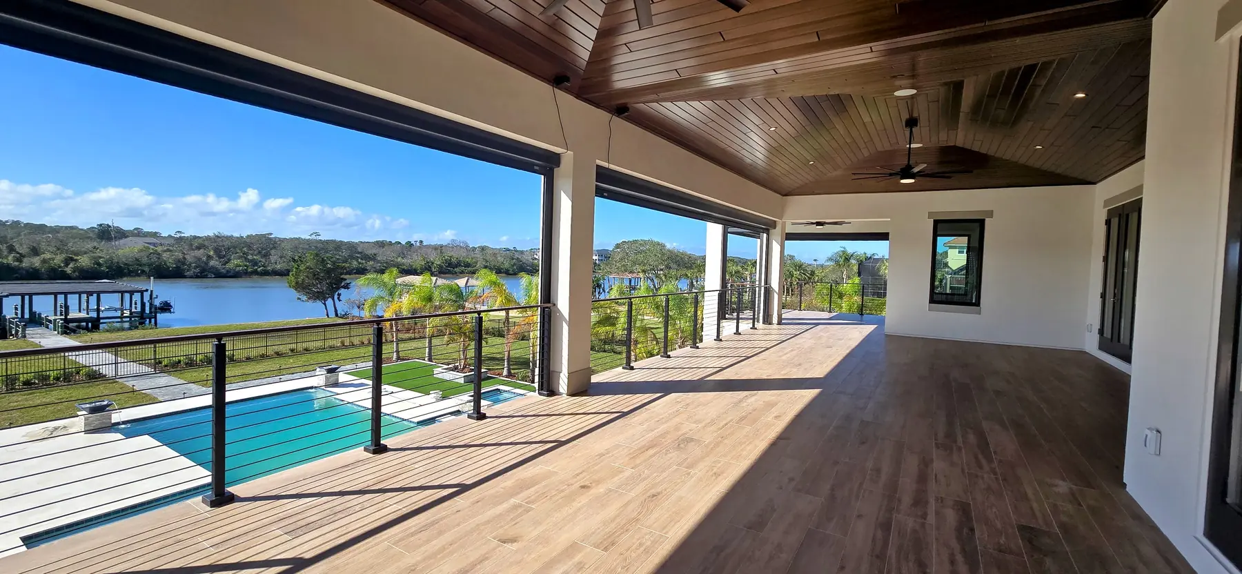 Red Grandis Mocha tongue-and-groove ceiling overlooking a Central Florida waterfront