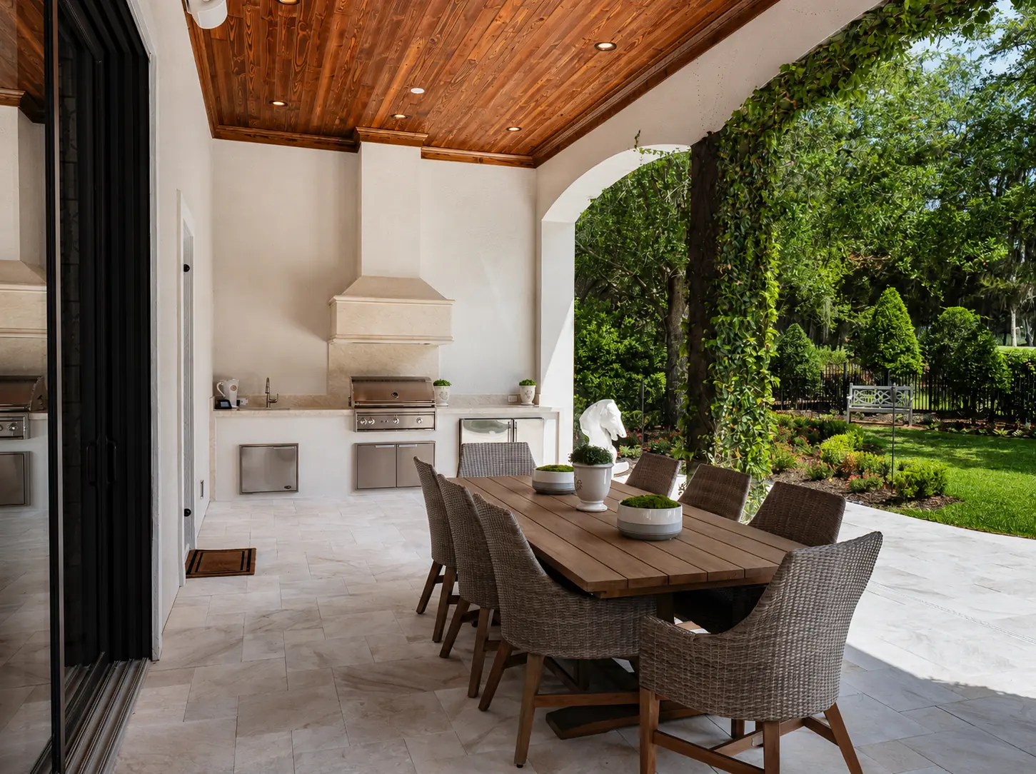 Southern Pine Auburn wood ceiling over a covered terrace and outdoor kitchen