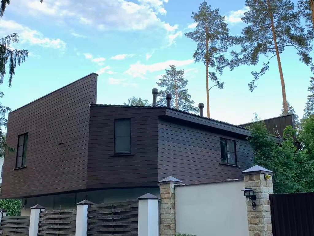 Thermally modified Ash siding on a modern residence